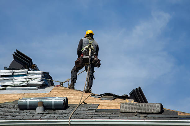 Professional Roof Replacement technician working in Lancaster, MA